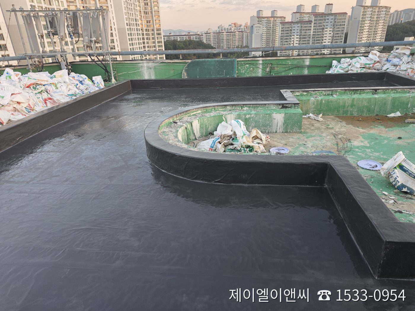 용인 ○○타운 옥상 도막 부직포 복합방수 담수시험 완료